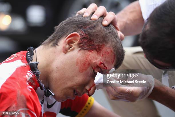 Janez Brajkovic of Slovenia and team Radioshack is dazed after a heavy fall during Stage 5 of the 2011 Tour de France from Carhaix to Cap Frehel on...