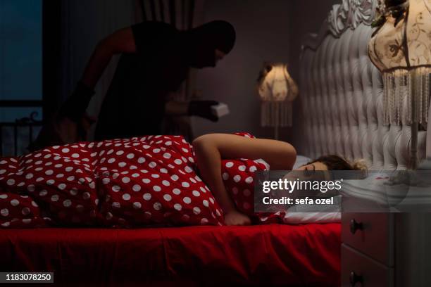 jewelry thief in the bedroom - prowling stock pictures, royalty-free photos & images