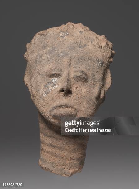 Figure, 1800s. A master female potter among the Asante created this clay sculpture to commemorate the departed. While not a naturalistic portrait,...