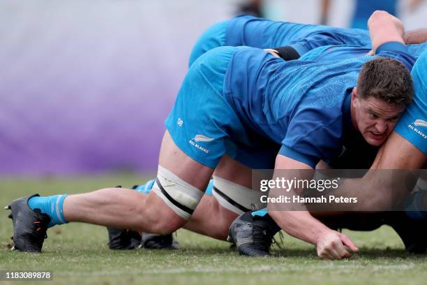 Scott Barrett of the All Blacks runs through drills during a New Zealand All Blacks training session at Tatsuminomori Seaside Park on October 24,...