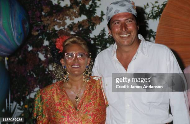 French Politician Patrick Balkany and his wife Isabelle Balkany attending Tony Murray's party in St Tropez, 29th July 1990