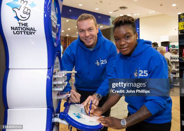 Olympic medallists, including Sir Chris Hoy and Nicola Adams, purchase lottery tickets to celebrate The National Lottery's 25th Birthday and its...