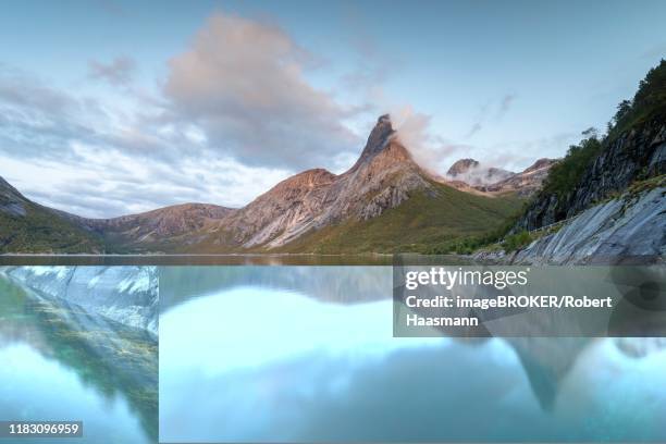 stetind is reflected in fjord, norwegian national mountain, tysfjord, ofoten, nordland, norway - stetind stock pictures, royalty-free photos & images