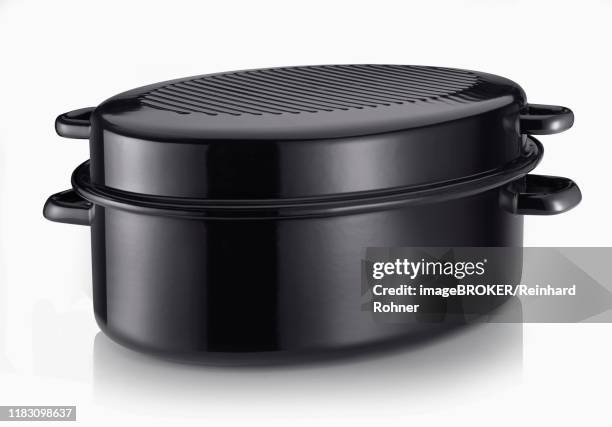 black roaster, studio shot, cutout, white background, germany - forno olandese foto e immagini stock