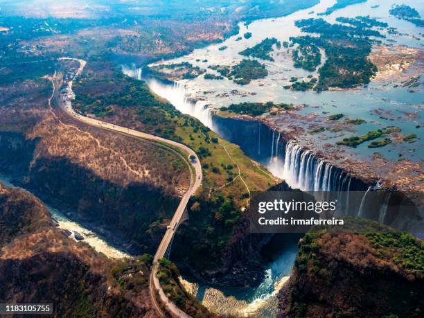 aerial view of victoria falls, zimbabwe - victoria falls stock pictures, royalty-free photos & images