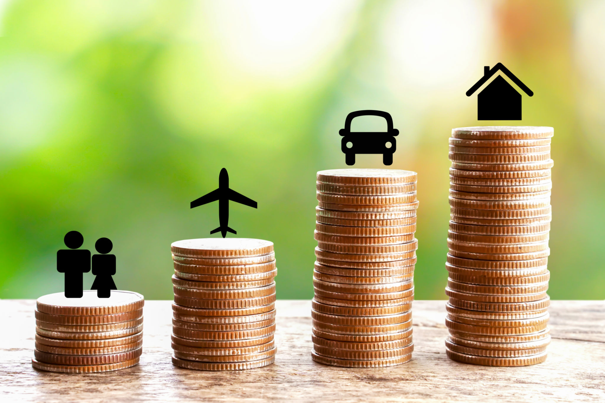 wealth concept with stack of coin home,car,happy couples icons wealth concept with stack of coin home,car,happy couples icons
