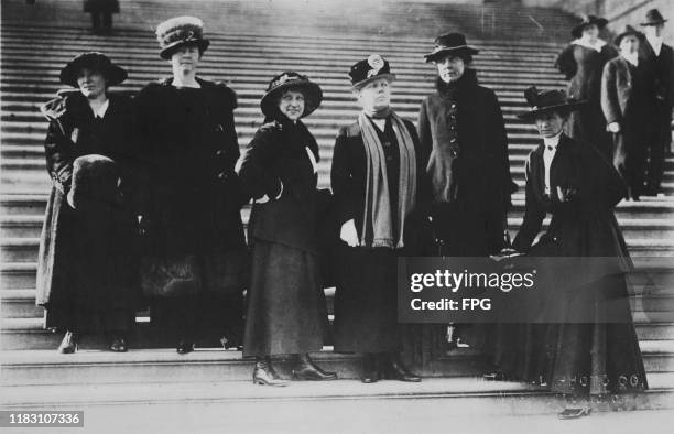 Women of the Congressional Union who unfurled a banner over the rail of the Gallery while President Wilson was reading a message to Congress, the...