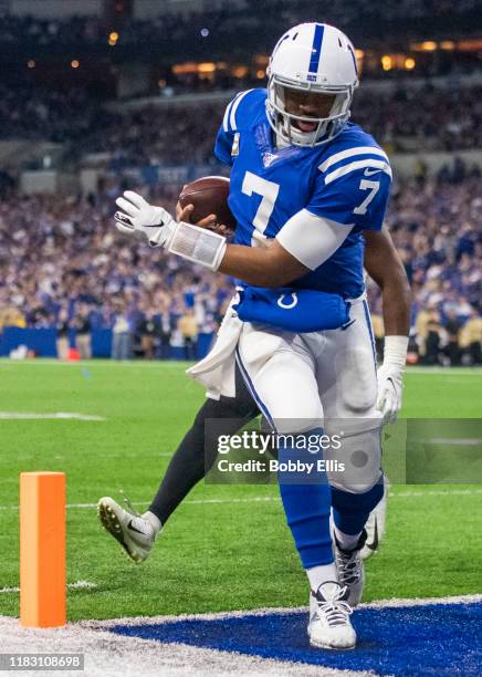 Jacoby Brissett of the Indianapolis Colts runs for a touchdown during the third quarter of the game against the Jacksonville Jaguars at Lucas Oil...