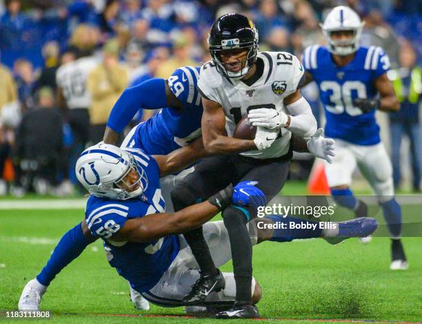 Dede Westbrook of the Jacksonville Jaguars is tackled after making a catch in the third quarter of the game against the Indianapolis Colts at Lucas...