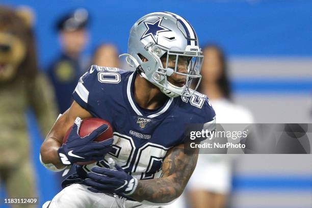 Dallas Cowboys running back Tony Pollard runs the ball during the second half of an NFL football game against the Detroit Lions in Detroit, Michigan...