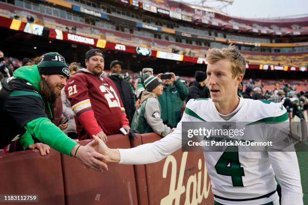 Lac Edwards of the New York Jets celebrates with fans after the Jets defeated the Washington Redskins 34-17 at FedExField on November 17, 2019 in...