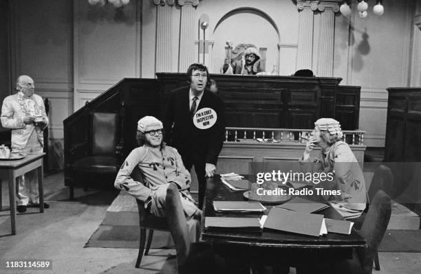 Comedic actors Erik Chitty, Graeme Garden, Jack Douglas, Bill Oddie and Tim Brooke-Taylor in a sketch from episode 'Goodies in the Nick' of the BBC...