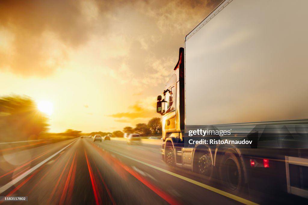 Lorry Traffic Transport on motorway in motion