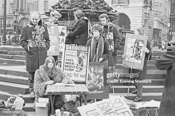 English model and actress Jean Shrimpton joins a group of anti-war protestors campaigning to end the killing of civilians in Biafra and the Nigerian...