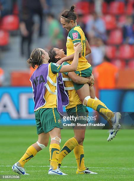 Kyah Simon of Australia celebrates with Samantha Kerr of Australia at the end of the FIFA Women's World Cup 2011 group D match between Australia and...