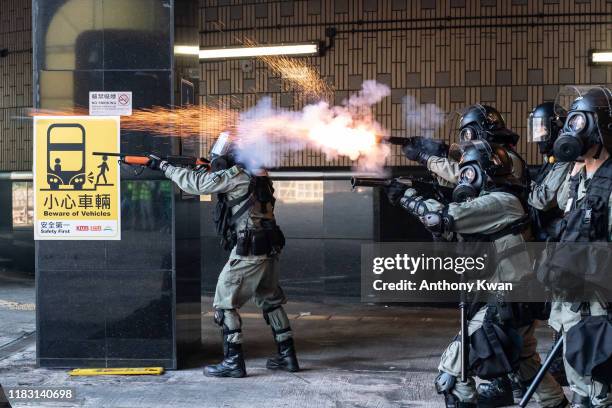 Riot police fire teargas and rubber bullets as protesters attempt to leave The Hong Kong Poytechnic University on November 18, 2019 in Hong Kong,...