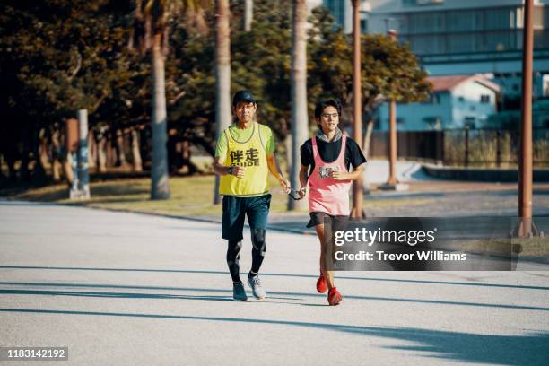 Guide Running Visually Impaired Runner Photos and Premium High Res Pictures - Getty ...