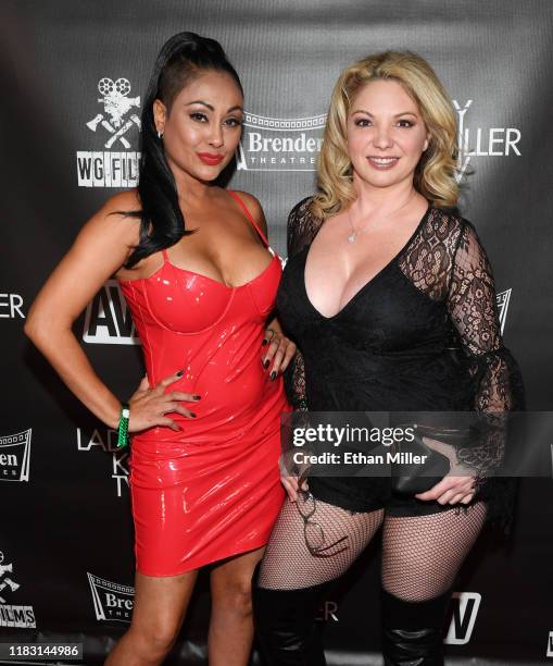 Adult film actresses Priya Rai and Kiki D'Aire attend the world premiere of the film "LadyKillerTV" at the Brenden Theatres inside Palms Casino...
