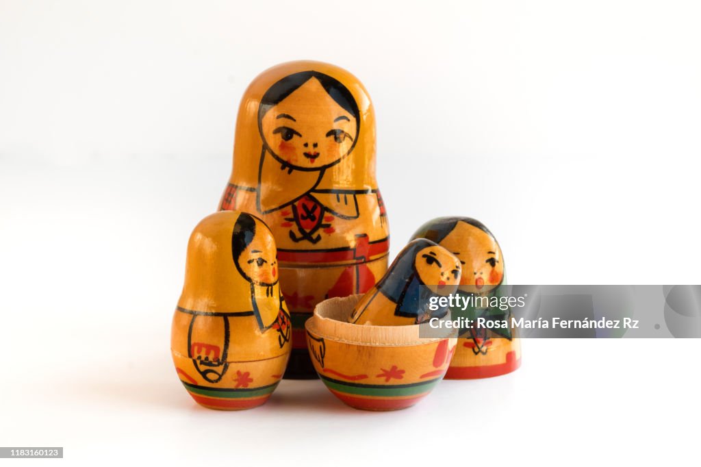 Russian Nesting Dolls Representing A Family With Two Children On White  Background High-Res Stock Photo - Getty Images