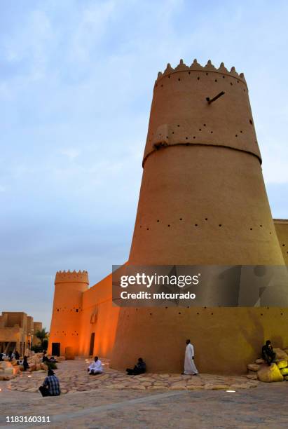 al masmak fortress at dusk, riyadh, saudi arabia - ibn saud stock pictures, royalty-free photos & images