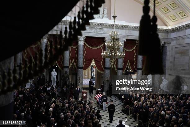 The flag-draped casket of U.S. Rep. Elijah Cummings is carried by honor guard to the Statuary Hall of the U.S. Capitol for a memorial service October...