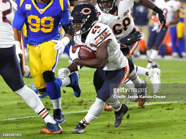 Running back Tarik Cohen of the Chicago Bears carries the ball for a short gain in the first half against the Los Angeles Rams at the Los Angeles...