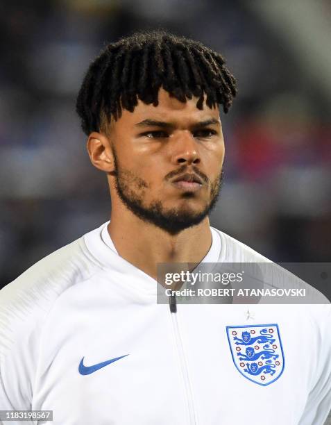 England's defender Tyrone Mings poses ahead of the UEFA Euro 2020 qualifying Group A football match between Kosovo and England in Pristina on...