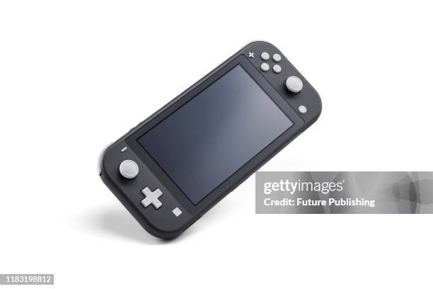 Nintendo Switch Lite handheld video games console with a Gray finish, taken on November 7, 2019.