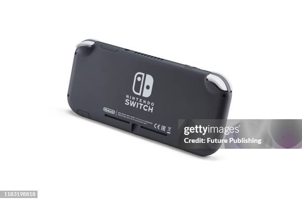 Rear view of a 2019 Nintendo Switch Lite handheld video games console with a Gray finish, taken on November 7, 2019.