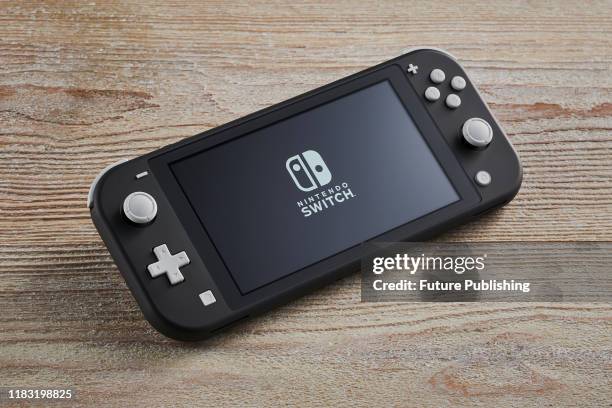 Nintendo Switch Lite handheld video games console with a Gray finish, taken on November 7, 2019.