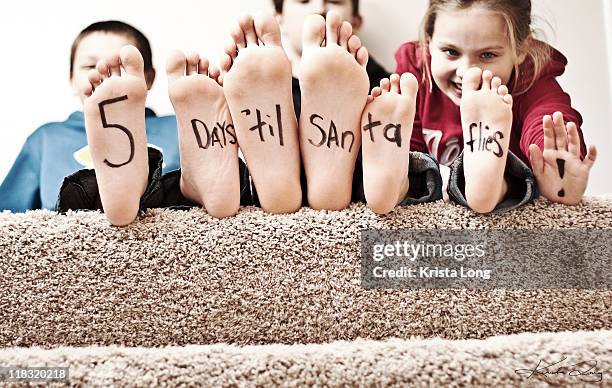 child  written on bottoms of their feet - teen soles stock pictures, royalty-free photos & images