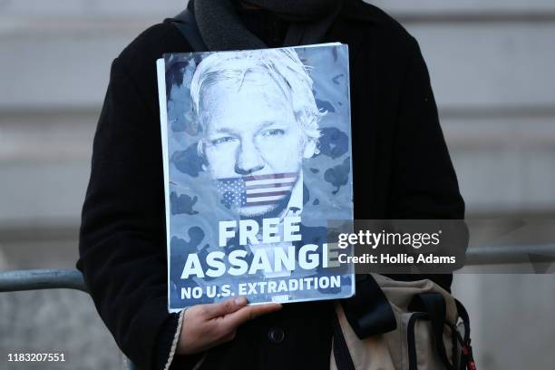 Julian Assange supporters demonstrate outside of the Westminster Magistrates Court on November 18, 2019 in London, England.