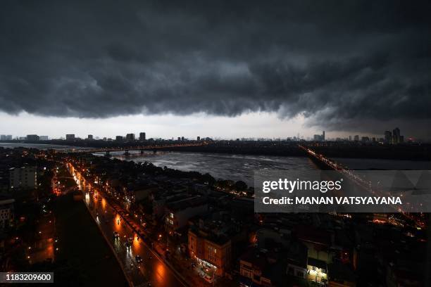 Dark clouds are seen over the Hanoi skyline on November 18, 2019.