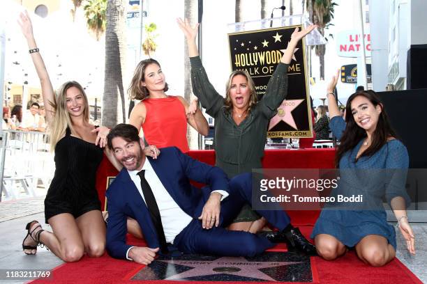Harry Connick Jr. Poses with his wife Jill Goodacre Connick and daughters Georgia Connick , Charlotte Connick and Sarah Connick during a ceremony...