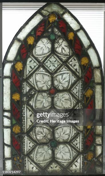 Stained Glass Panel with Aconite Leaves, circa 1275-1300. This stained glass panel is decorated in a grisaille technique but also includes a coloured...