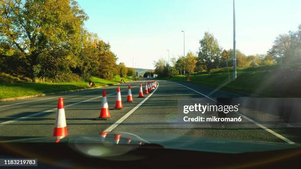 road safety cones. road works - road closed stock pictures, royalty-free photos & images