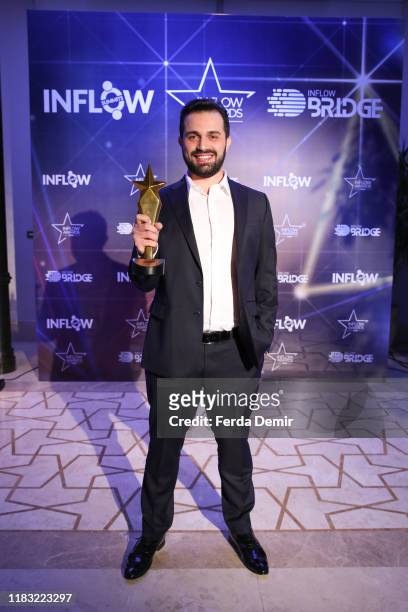 Burak Altindag poses with his award Influencer with the most creative content during the Inflow Global Awards 2019 at the Four Seasons Bosphorus...