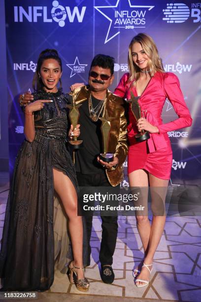 Diipa Buller-Khosla, Sanne Vloet and Justsul pose with their awards during the Inflow Global Awards 2019 at the Four Seasons Bosphorus Hotel on...