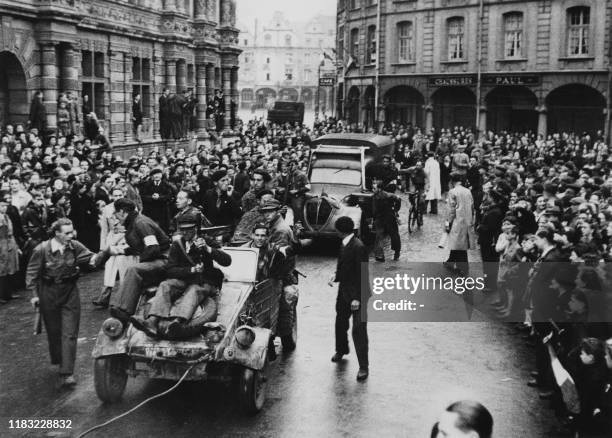 Picture dated on September 5, 1944 showing F.F.I. Members parading through the streets of Arras, northern France, after the city's liberation.