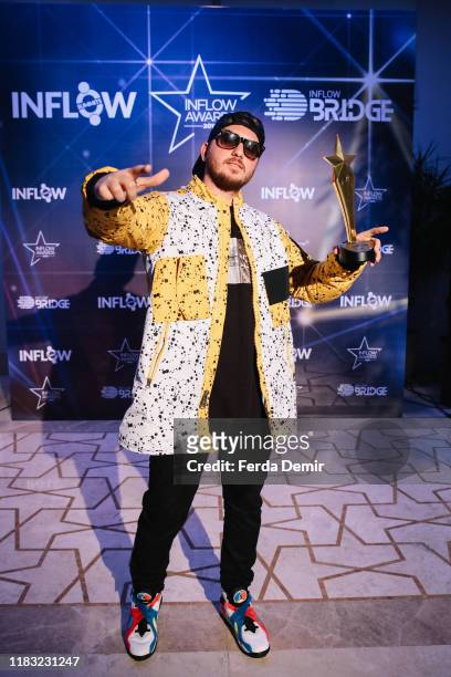 Anıl Piyancı poses with his award YouTube Duet of the Year during the Inflow Global Awards 2019 at the Four Seasons Bosphorus Hotel on October 22,...