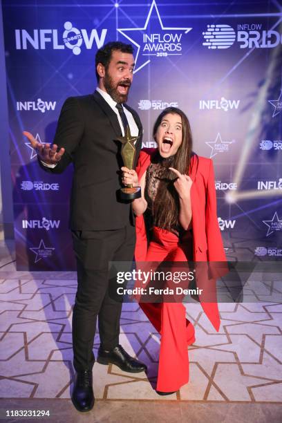 Maya Devir and Yehuda Devir pose with their award The Most Creative Content Maker during the Inflow Global Awards 2019 at the Four Seasons Bosphorus...