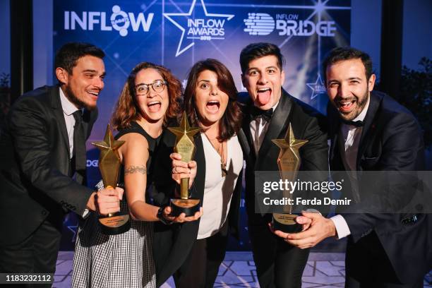 Refika Birgul, Kerem Dıramca, Bahar Kitapcı, Tunc Akyuz and Inan Oz pose with their awards Best Gastronomy Influencer Campaign during the Inflow...