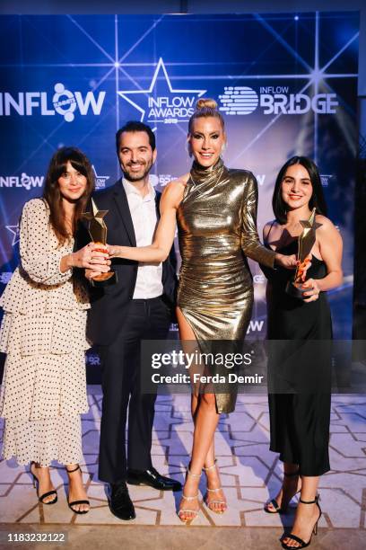 Cagla Sikel, Emirhan Kokcu, Idil Bilginer, Basak Leyla Kacar pose with her award Best Omni-Channel Influencer during the Inflow Global Awards 2019 at...