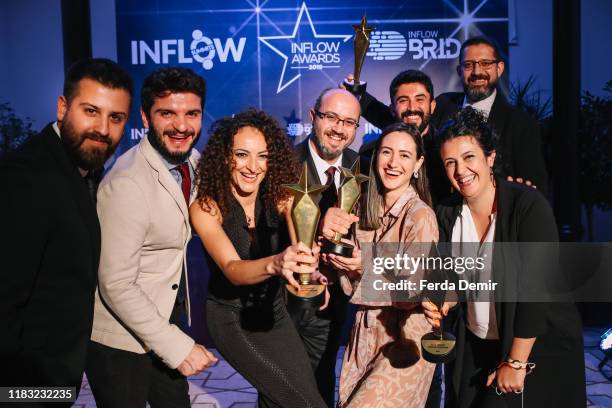 The team pose with their awards Best Technology Influencer Campaign during the Inflow Global Awards 2019 at the Four Seasons Bosphorus Hotel on...
