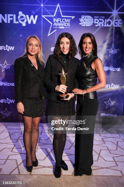 Hande Cilingir pose with her awards Women in Technology Special Award during the Inflow Global Awards 2019 at the Four Seasons Bosphorus Hotel on...