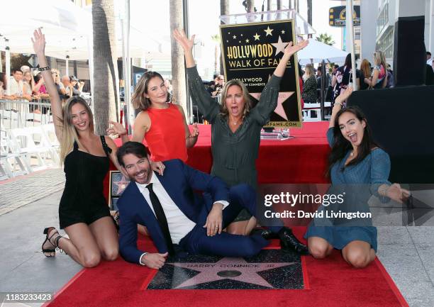 Harry Connick Jr., wife Jill Goodacre and daughters Georgia Tatum Connick, Sarah Kate Connick and Charlotte Connick attend as he is honored with a...