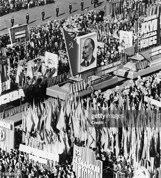 Trucks transport the portrait of Soviet state founder Vladimir Lenin, during the traditionnal march-past on Red Square to mark celebrations of May...