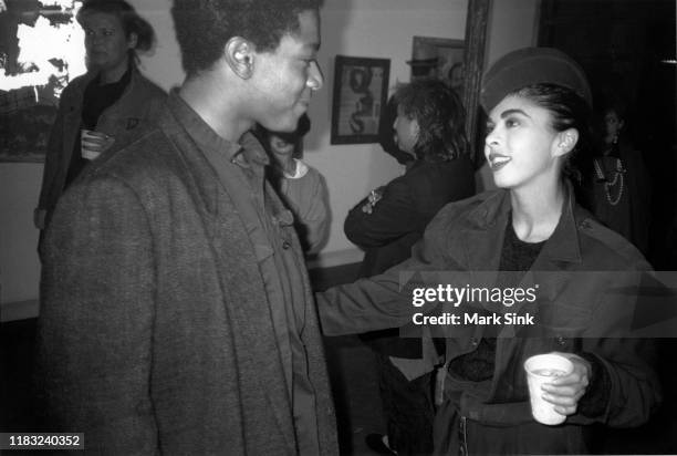 Jean-Michel Basquiat and Suzanne Mallouk at the Patrick Fox Gallery, September 5, 1985 in New York, New York.