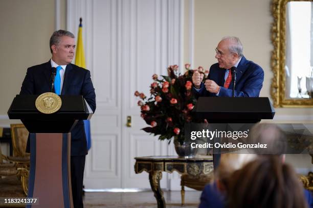 José Ángel Gurría , Secretary General of the Organization for the OECD, addresses the President of Colombia Ivan Duque Marquez and congratulates the...