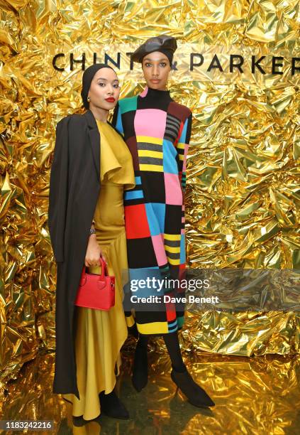 Amina Begum Ali and Ikram Abdi Omar attend the celebration of Chinti & Parker's 10-year anniversary, and the launch of their capsule collection to...